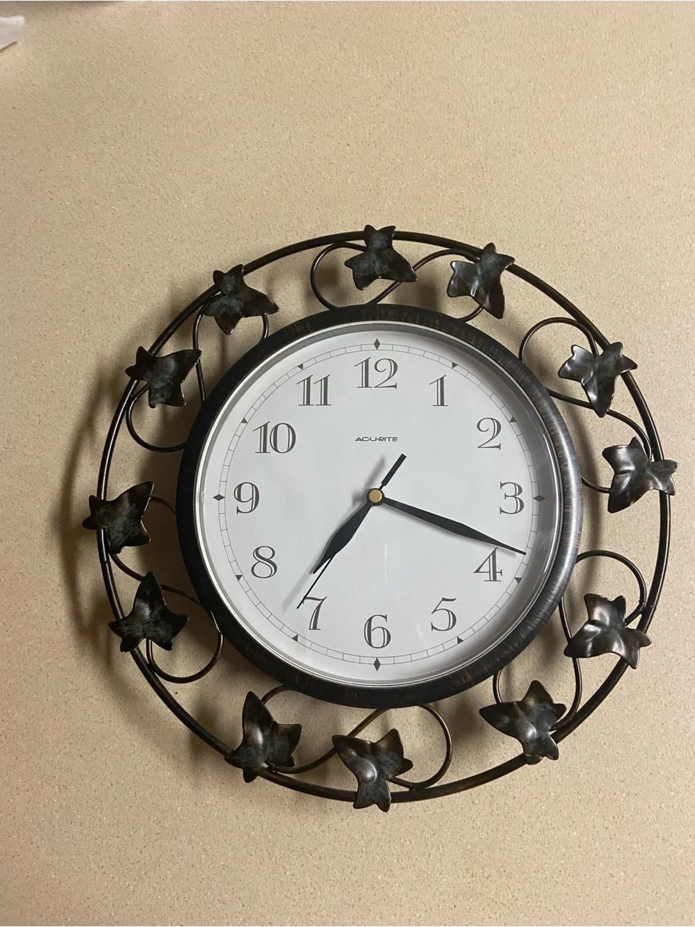 Floral Metal Wall Clock in Bronze